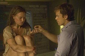 Julia Stiles and Michael C. Hall in 'Dexter' — Photo courtesy of Cliff Lipson / Showtime