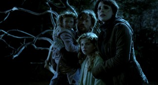 Isabelle Nélisse, Megan Charpentier, Nikolaj Coster-Waldau and Jessica Chastain in 'Mama' — Photo courtesy of Universal Pictures