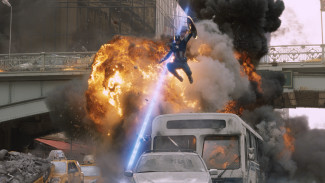 Captain America (Chris Evans) leaps from a fire in Avengers: Age of Ultron — Photo courtesy of Film Frame © 2011 MVLFFLLC.  TM & © 2011 Marvel.  All Rights Reserved.