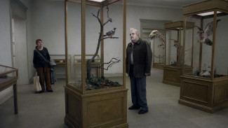 Per Bergqvist and Solveig Andersson star in A Pigeon Sat on a Branch Reflecting on Existence, a Magnolia Pictures release — Photo courtesy of Magnolia Pictures