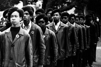 Panthers are on parade at Free Huey rally in Defermery Park (named by the Panther Bobby Hutton Park) in West Oakland. Oakland, July 28, 1968. Photo courtesy of Stephen Shames.