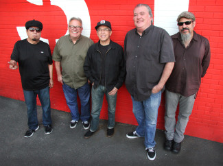 The members of Los Lobos include, from left, Cesar Rosas, Conrad Lozano, Louie Perez, David Hildago and Steve Berlin. Photo courtesy of David Alan Kogut.