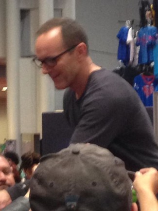 Clark Gregg, star of Agents of SHIELD, signs autographs at the Marvel booth. Photo by John Soltes.