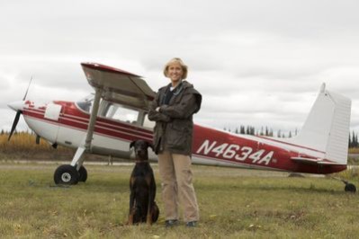 Dr. Dee Thornell stars in Dr. Dee: Alaska Vet. Here she's pictured with Jinx. Photo courtesy of Animal Planet.