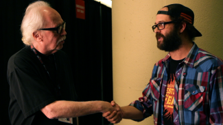 John Carpenter and Tal Zimerman meet in Why Horror? Photo courtesy of Don Ferguson Productions.