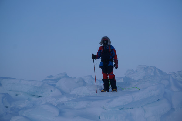 Explorer Eric Larsen stands on top of an ice block. Photo courtesy of Animal Planet.