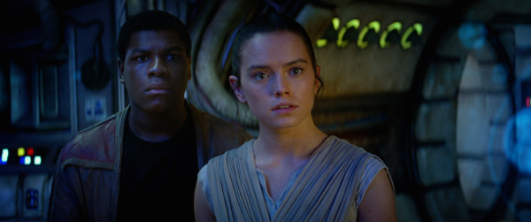 Star Wars: The Force Awakens stars, from left, John Boyega and Daisy Ridely. Photo courtesy of © 2014 Lucasfilm Ltd. & TM. All Right Reserved..