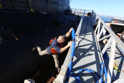 Rookie Dan Schoen jumps from submarine to dock on Deadliest Job Interview. Photo courtesy of Discovery Channel.