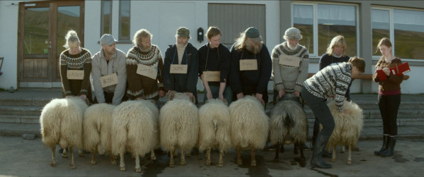 Sigurður Sigurjónsson stars as “Gummi” (third from left), and Theodór Júlíusson stars as “Kiddi” (fourth from right) in Rams directed by Grímur Hákonarson. Photo courtesy of Cohen Media Group.