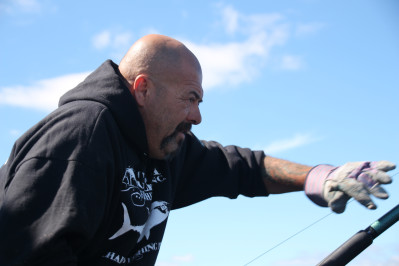 Captain Dave Marciano aims to bring a bluefin on board the Hard Merchandise. Photo provided by National Geographic Channels. Photo courtesy of Pilgrim Films & Television/Mitchell Long.