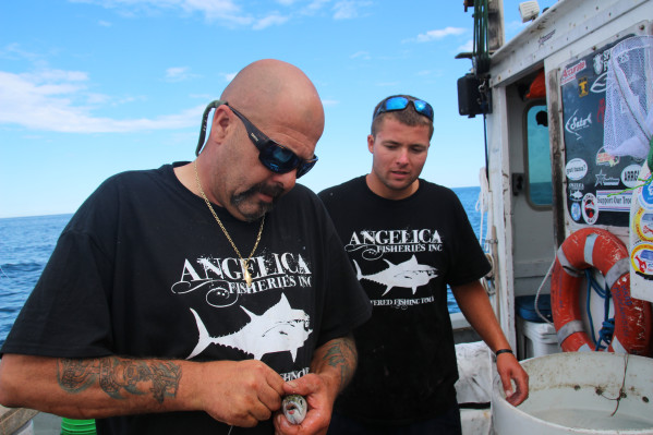 Deckhand Joe Marciano helps Capt. Dave Marciano make sure things are ship-shape aboard the Hard Merchandise. Photo provided by National Geographic Channels. Photo courtesy of Pilgrim Films & Television/ Mitchell Long.