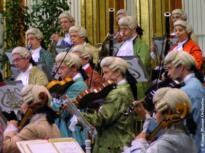 The violin section of the Vienna Mozart Orchestra travels back in time to the age of Wolfgang Amadeus Mozart. Photo courtesy of VMO.