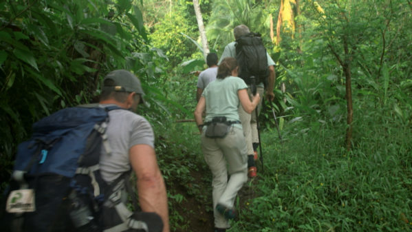 From left, Ken, Peggy, Jenkins and Roman hike into the jungle to investigate where Jenkins met Cody Roman Dial. Photo courtesy of National Geographic Channels.